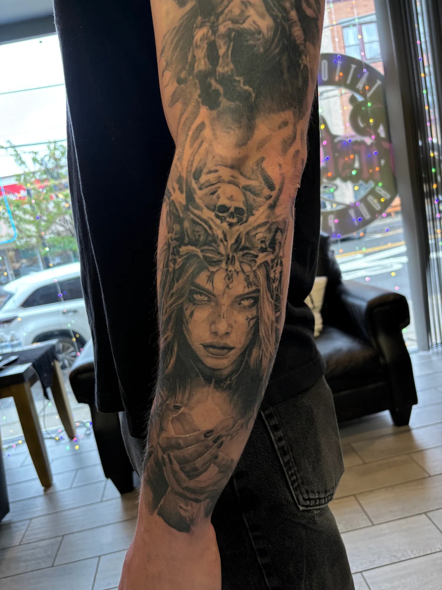 Large black and grey dark fantasy sleeve with warrior and skull imagery